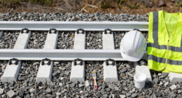 Painting The Sides Of Railroad Rails White To Reduce Derailment